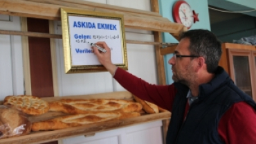 Bir Ekmek de Sen Al